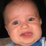 Close-up of baby crying.