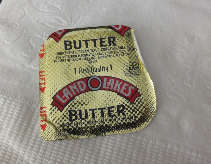 Label from individual-size butter portion: Land o' Lakes.