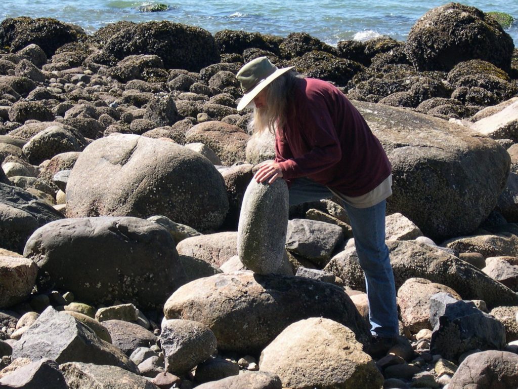 Kent Avery balancing rocks in Stanley Park