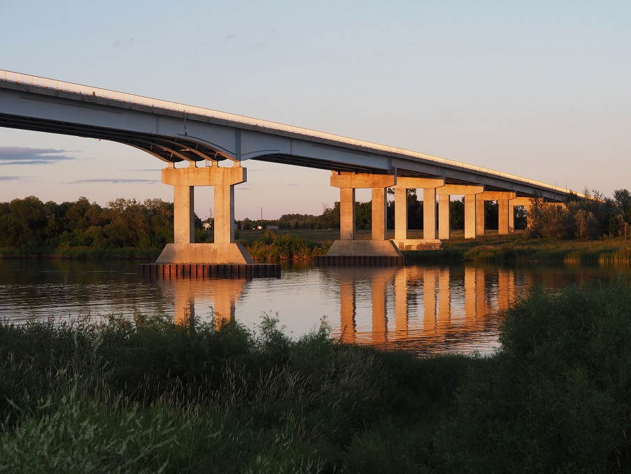 Cement pillar bridge at sunset