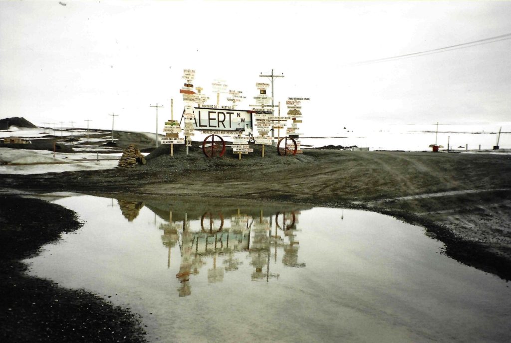 CFA Alert sign, reflected in a puddle.