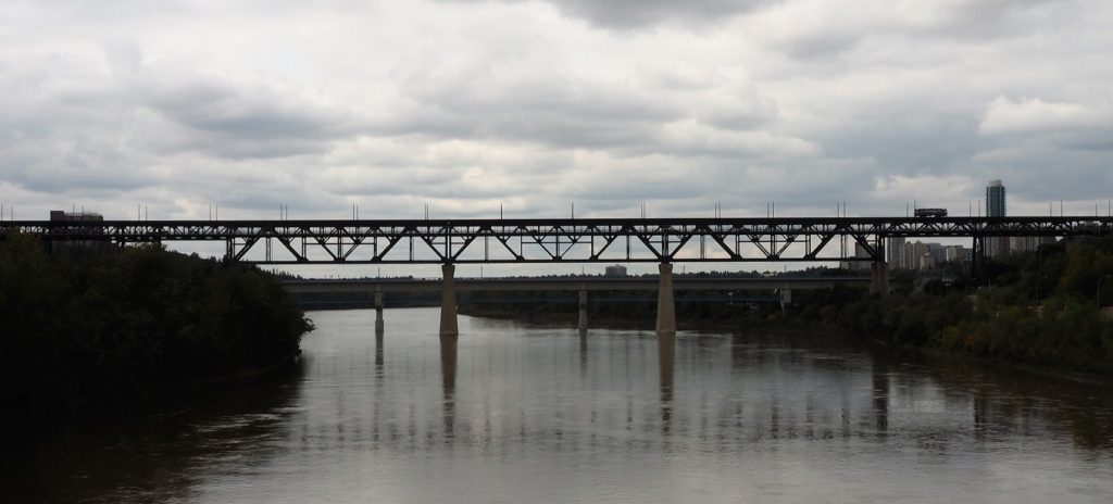 Full span of trestle bridge across North Saskatchewan River.