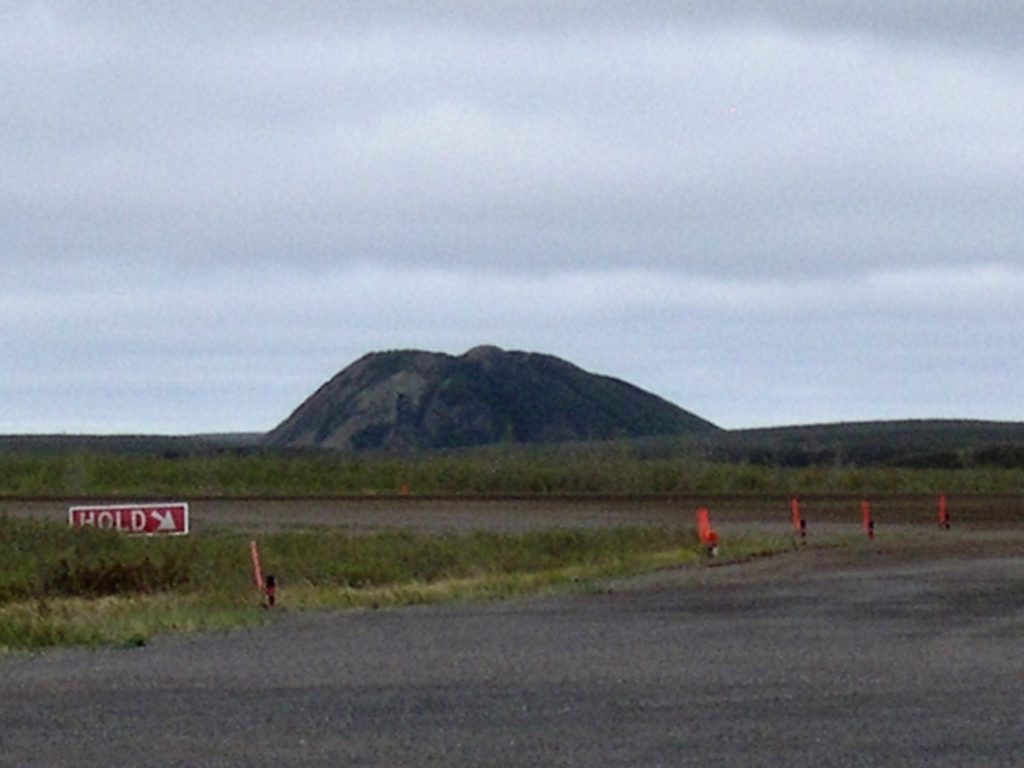 Irregular ice-dome hill near Tuktoyaktuk Airport.