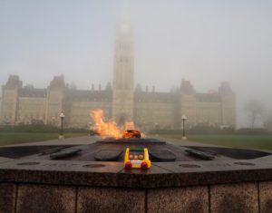 Campaign bus at eternal flame.