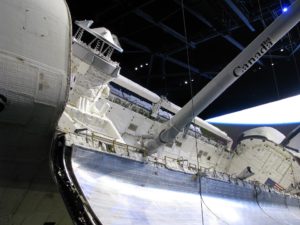 Canadarm in Space Shuttle Atlantis, on display at Kennedy Space Center