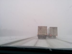 Snowy intertstate road in snow storm