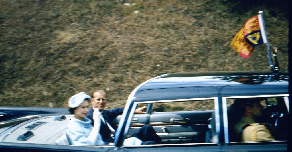 Queen Elizabeth II and Prince Philip in open touring car, Edmonton AB, 1959