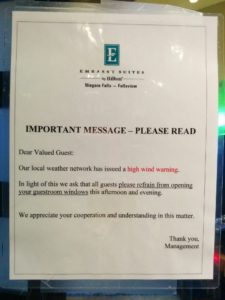 Hotel sign warning of high winds