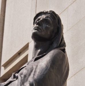 Close-up of bronze statue, Truth, in front of Supreme Court of Canada