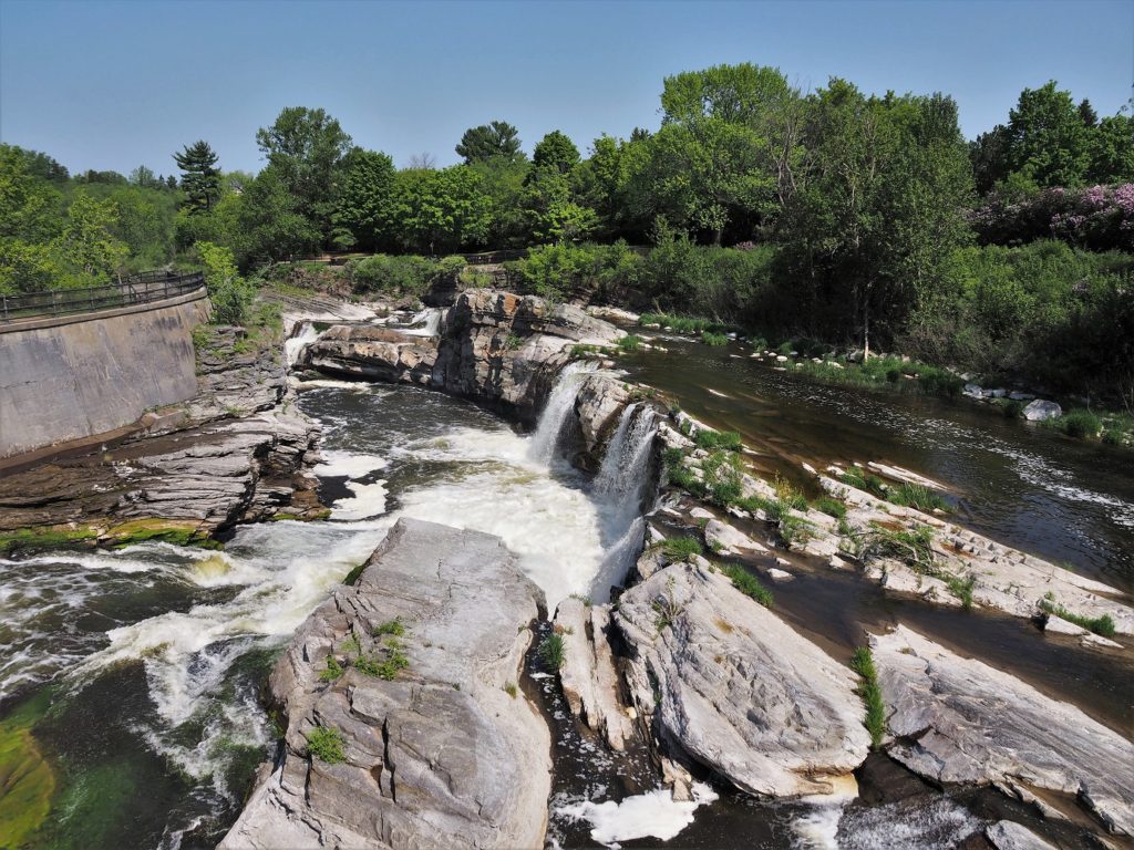 Rocky outbreak forming Hogsback Falls, near locks on Rideau River.