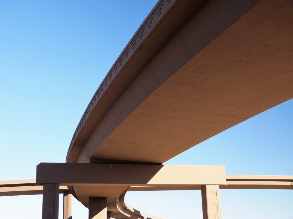 Arch of freeway ramp. seen from underneath.