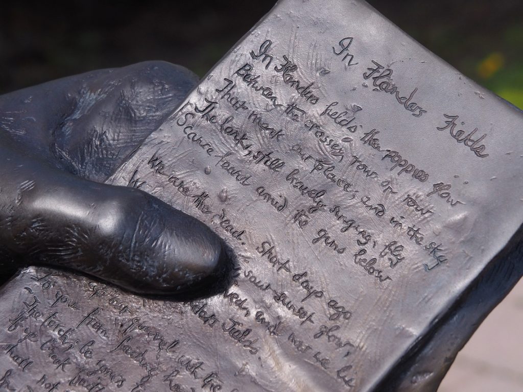 Text of "In Flanders Fields" from John McCrae statue.