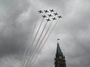 Nine Canadair Tutors in formation over Parliament Hill.