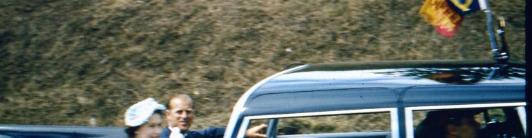 Queen Elizabeth II and Prince Philip in open touring car, Edmonton AB, 1959