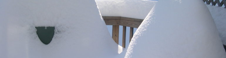 Snow-covered BBQs on deck.