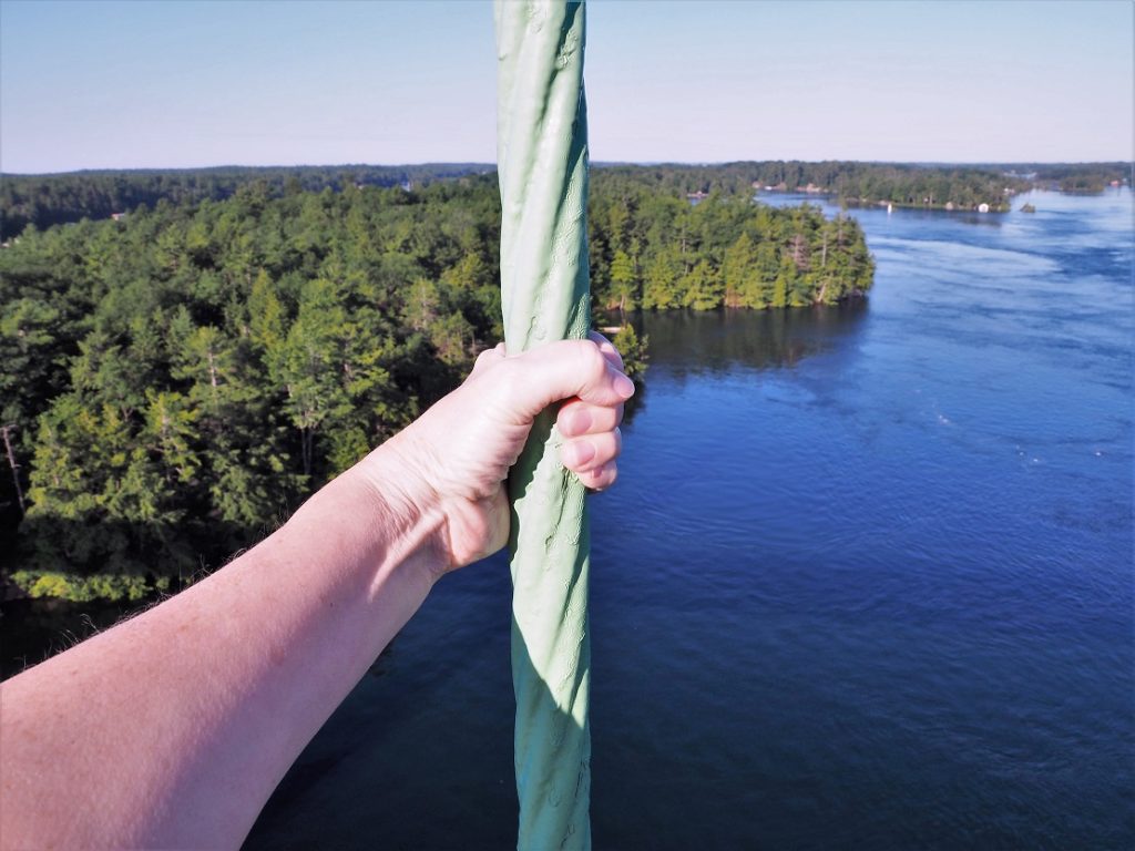 Suspension cable, with hand to indicate scale.
