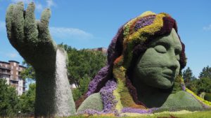 Mother Earth figure in floral or horticultural art