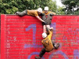 Getting the last person over the wall.