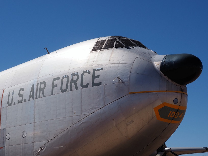 Side-on view of nose of airplane with smirk.