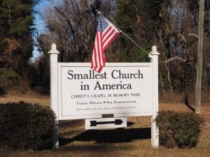 Sign announcing the smallest church in America.