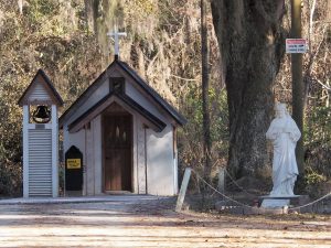 Small roadside chapel in the woods.