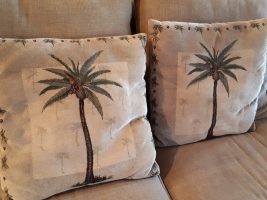 Throw cushions with sabal palmetto motif