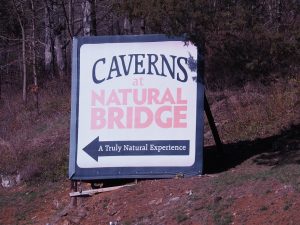 Roadside sandwich-board sign for caverns at Natural Bridge