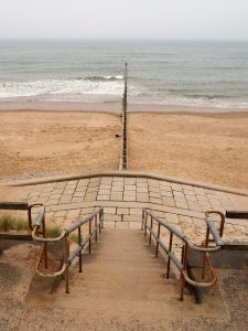 View of wooden breakwater from esplanade walkway