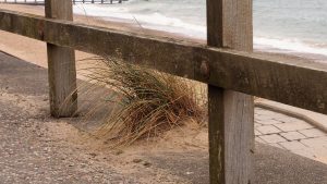 View of esplanade railing along Aberdeen beach