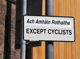 Traffic sign, half Irish, half English