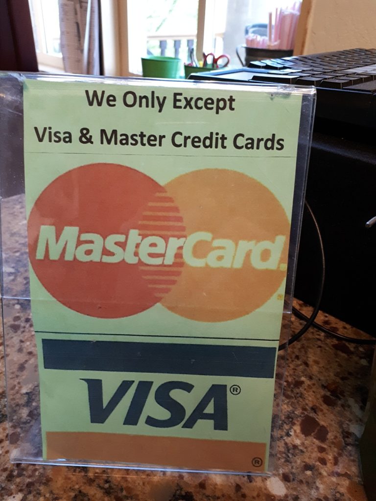 Sign "excepting" - as opposed to "accepting" - Visa and MasterCard