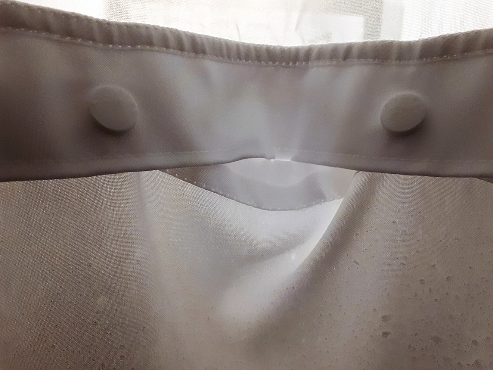 Accidental face in shower curtain