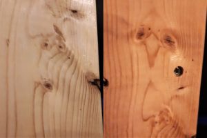 Faces in wood grain of two-by-fours