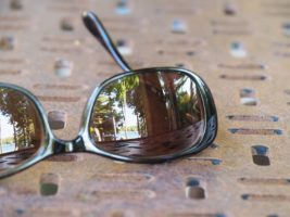 Lake reflected in sunglasses