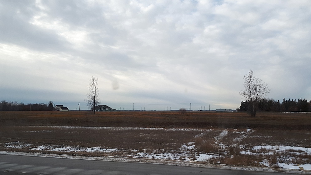 DReary view from car window in southern Manitoba
