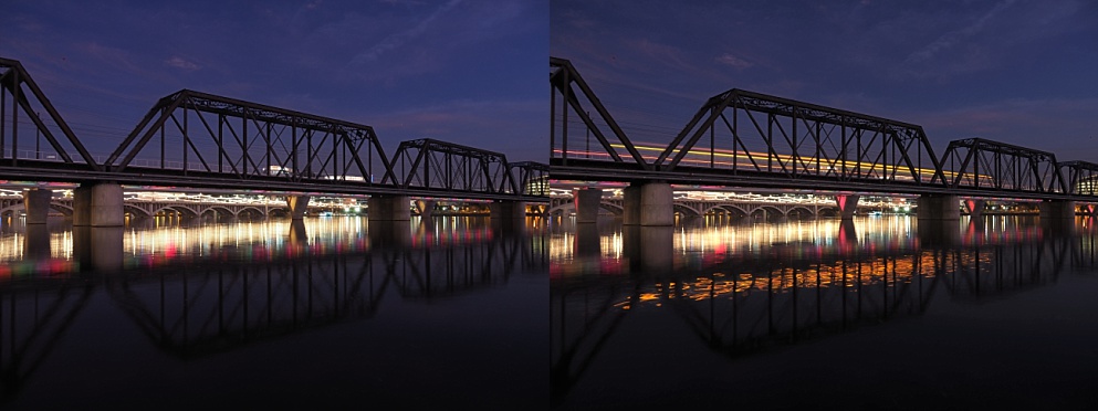 Showing the time-lapse passage of a train on bridge at night