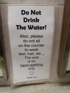 Sign about what to do in the sink