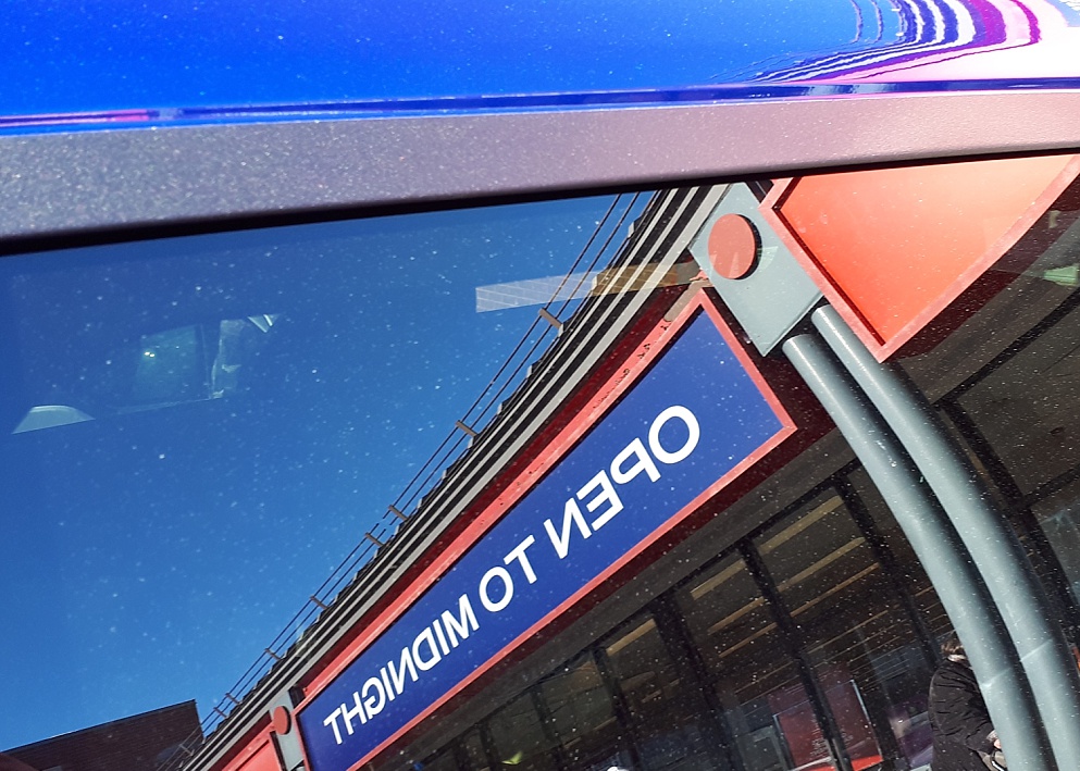 Colour-matching in car-window reflection